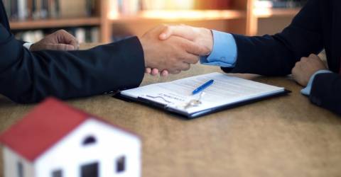 Hypotheek handen schudden woning huis kopen